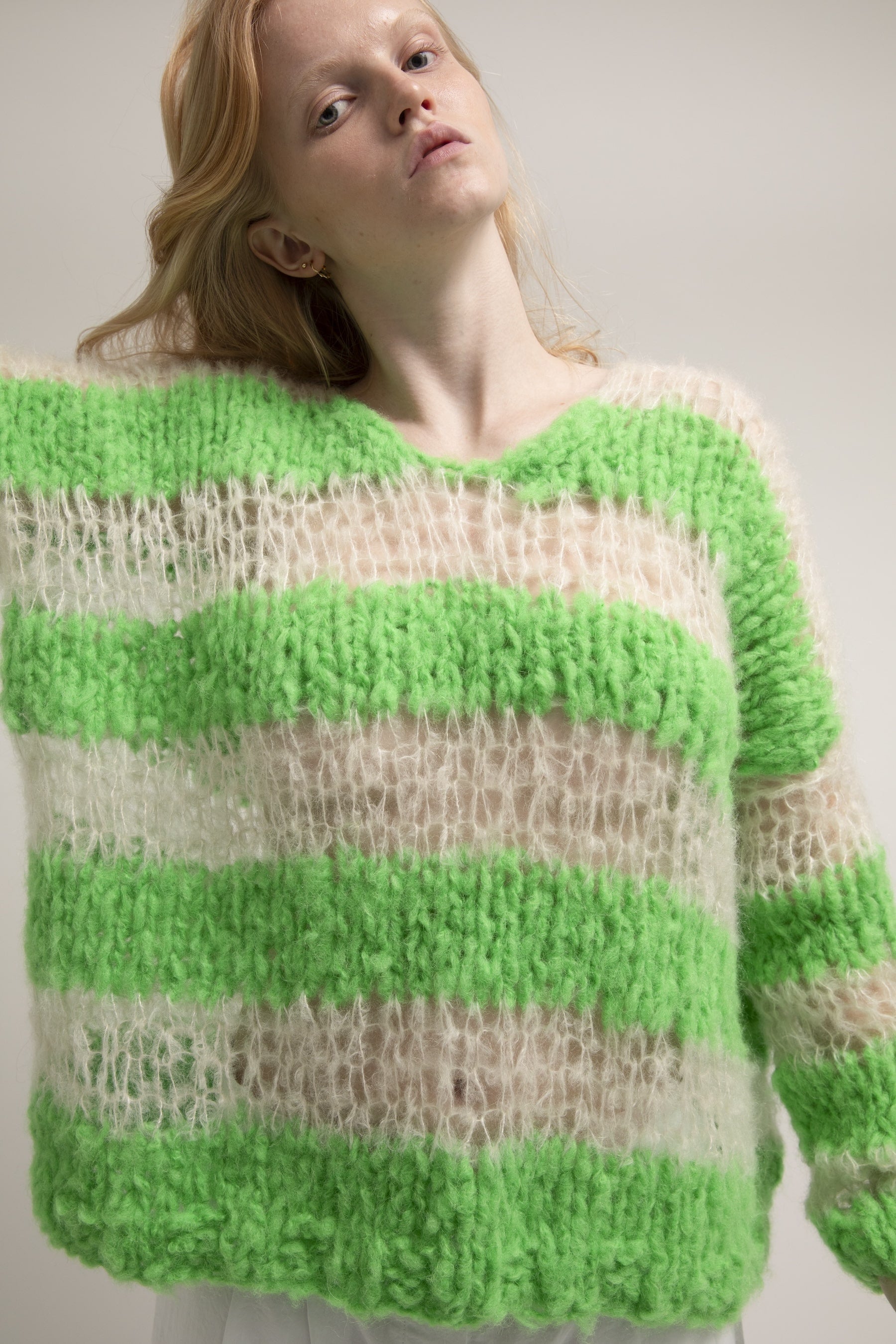 Kavi off white and green sweater