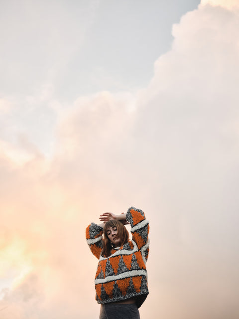 Spruce grey, white and orange sweater